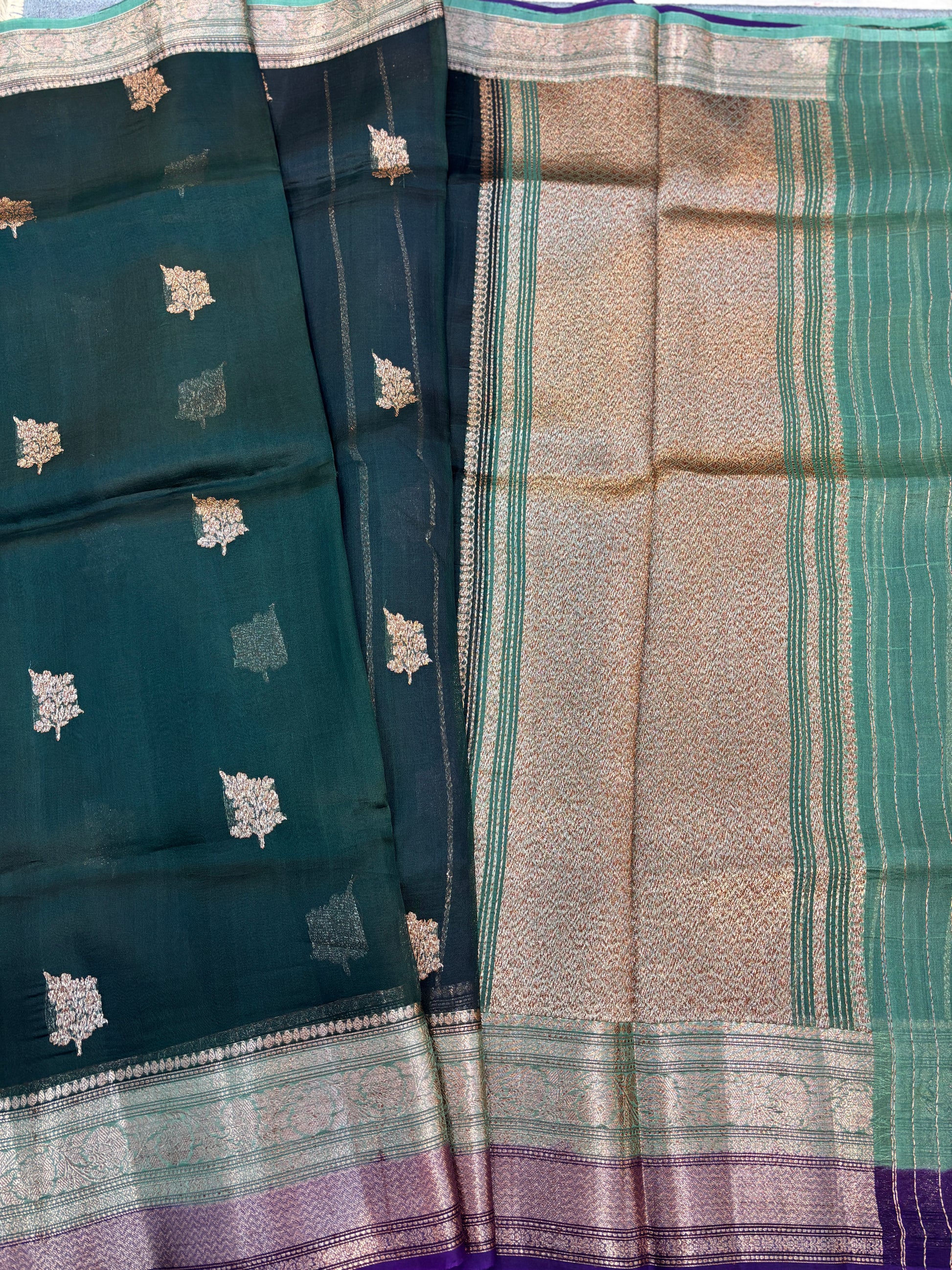 Teal and beige handloom saree with gold motif checks and woven green border