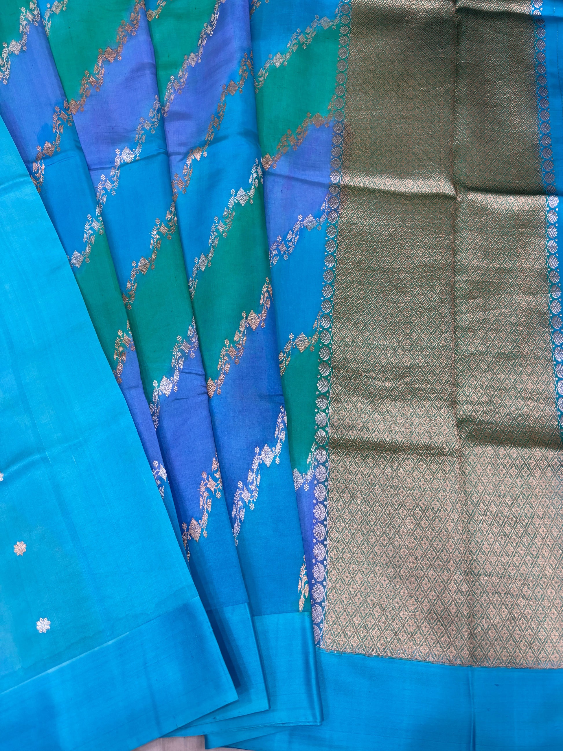 Blue silk saree with zigzag floral motif and woven gray-silver border