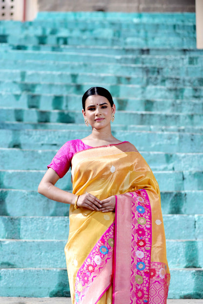 Yellow and pink saree with magenta border and patterned pallu