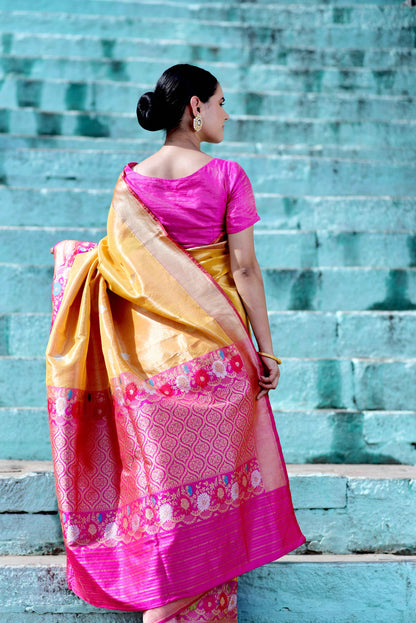 Yellow and pink saree with magenta border and patterned back drape