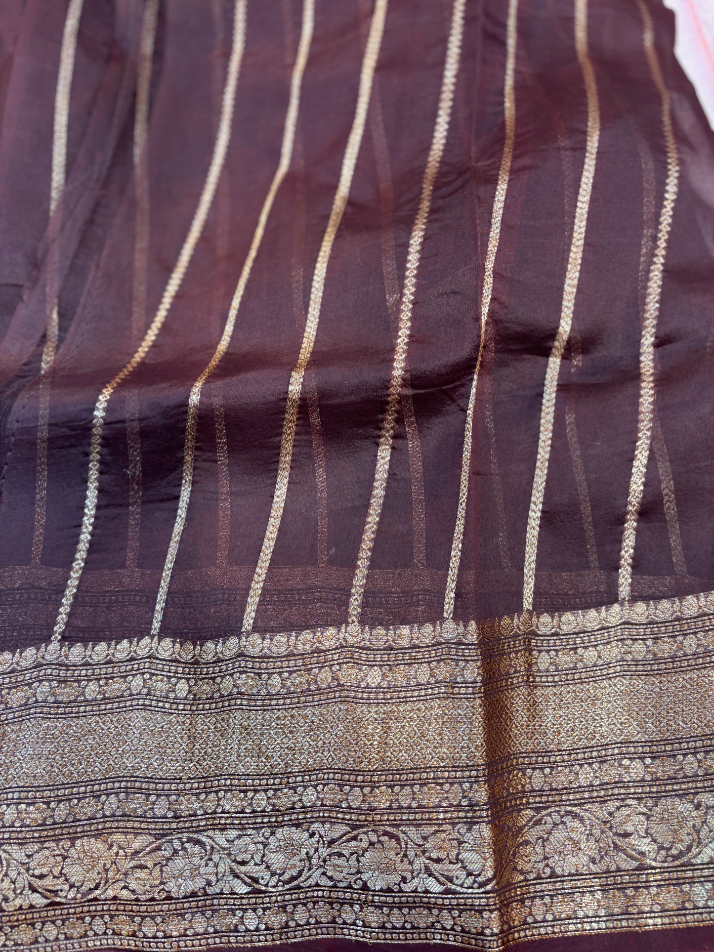 Plum silk saree with gold antique zari stripes and ornate border