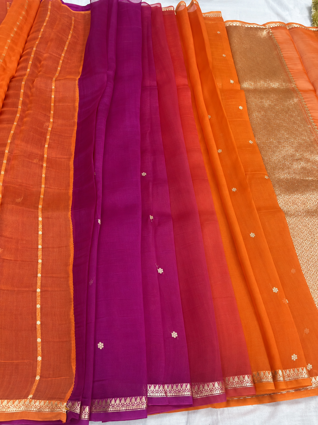 Purple and orange silk saree with gold zari border, woven stripes and motifs