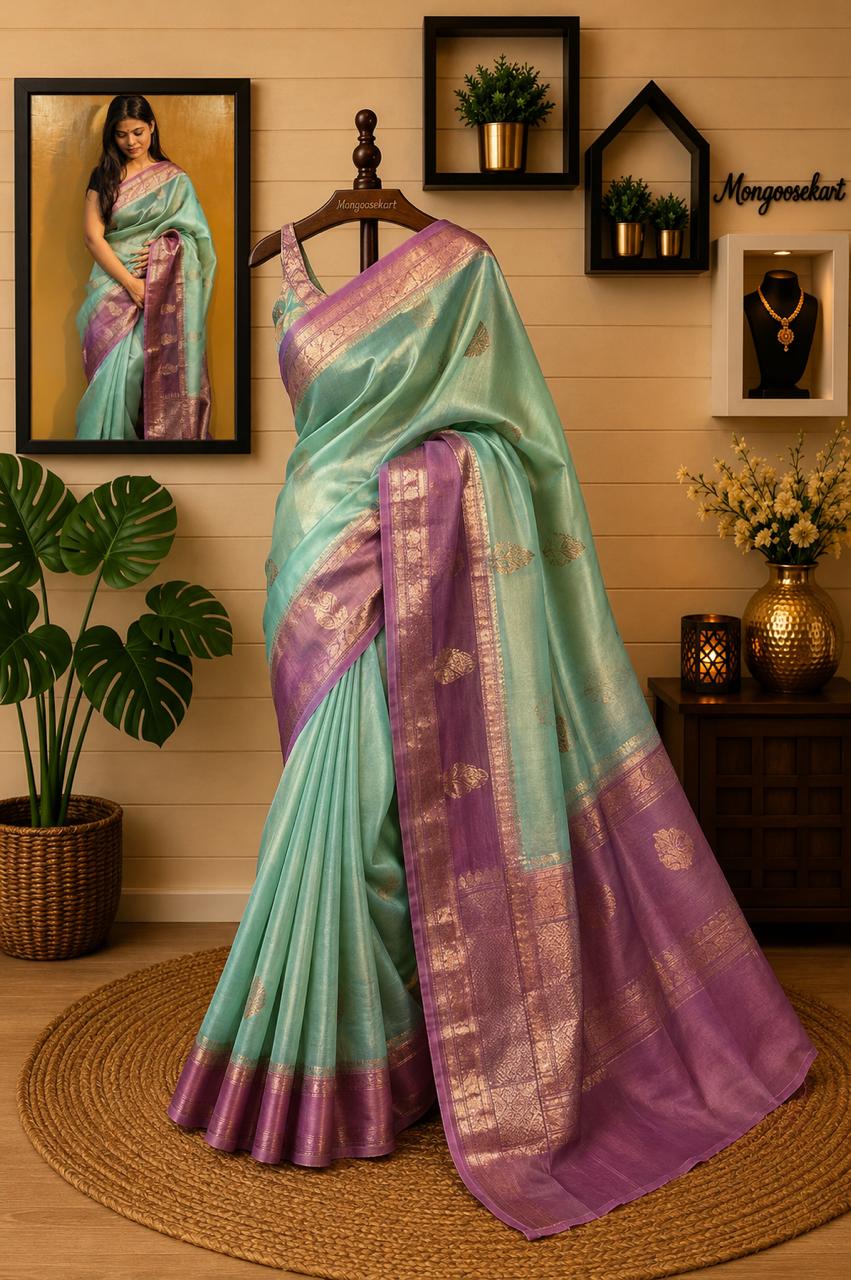 Banarasi handloom saree in mint with gold zari and purple border