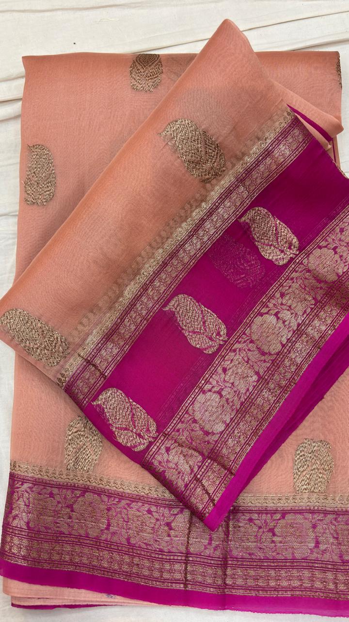 Banarasi handloom saree with peach body and magenta gold zari border